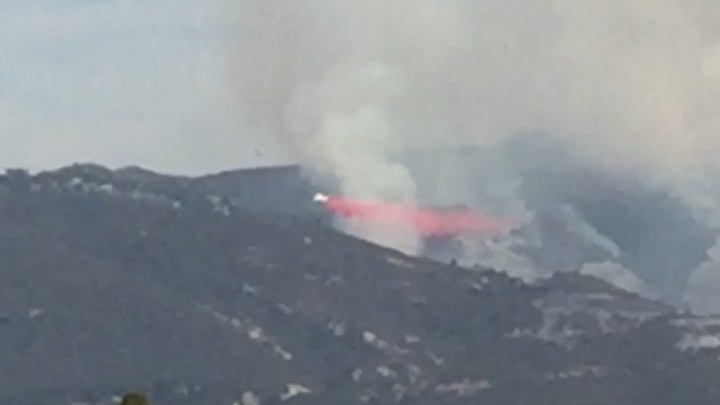 Apologies for the graininess, but here’s what the air attack on the #cavefire looks like from Goleta